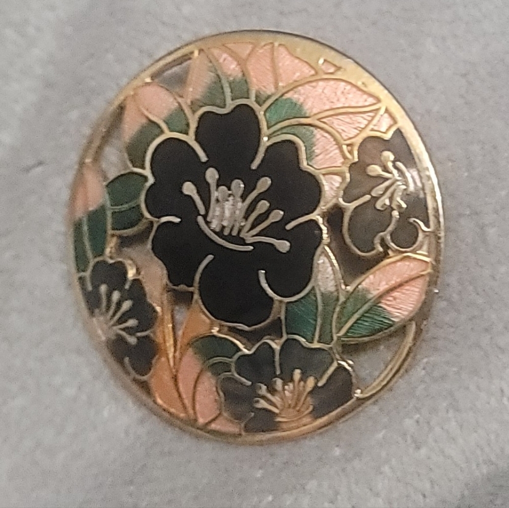 Cloisonne Beautiful vintage floral cutout brooch.